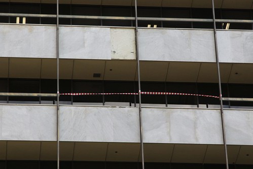 Missing marble panel on the facade of  447 Collins Street