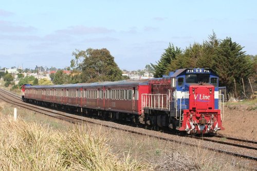 P14 leads an 8-car long push-pull football special at North Geelong