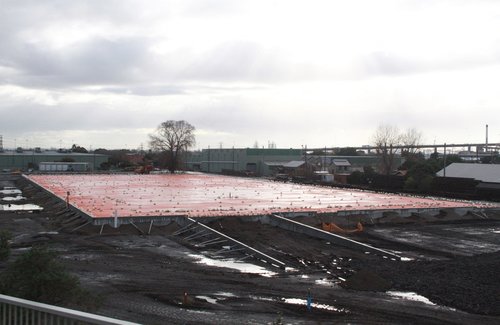Plastic cover in place over the contaminated soil