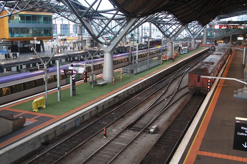 Artificial grass laid on platform 3/4 for a Dairy Farmers promotion