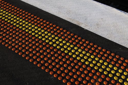 Tactile paving on a railway station platform