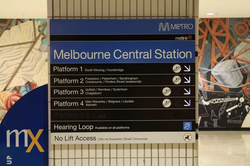 Illuminated platform directional signage at Melbourne Central