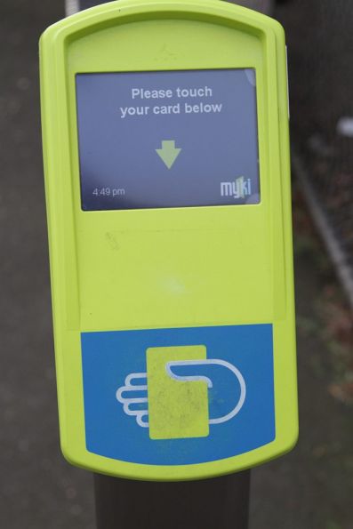 Must be new - a Myki reader without the touch pad printing scuffed off