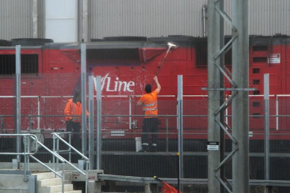 Washing down an N class in the train wash siding at Southern Cross