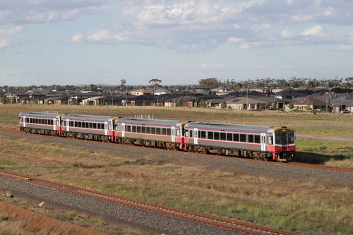 Quad Sprinters led by 7012 on a down Geelong service at Wyndham Vale South