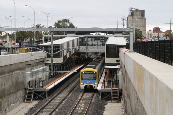 Siemens train pauses at Springvale station on the down