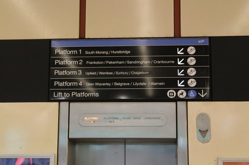 Illuminated directional signage at Flagstaff station