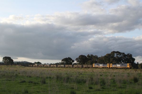 8166 leads 8132 towards Cootamundra West on an up containerised ore train from Goonumbla to Port Kembla