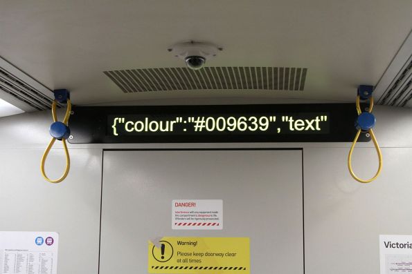JSON formatted 'Colour: #009639, text: Flinders Street' message displayed on the destination board of Siemens 816M